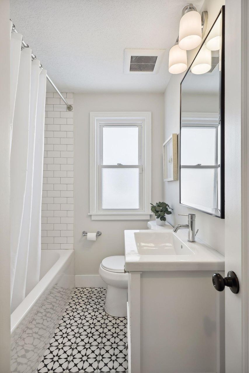 updated bathroom with white tile
