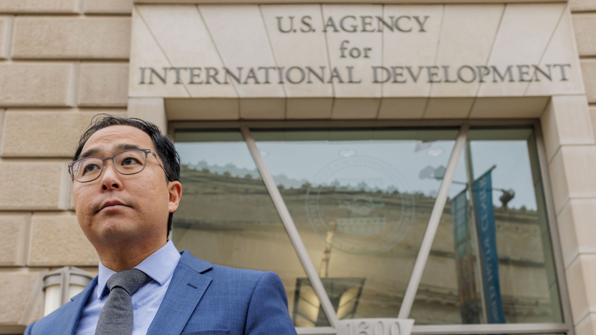 Sen. Andy Kim stands outside the U.S. Agency for International Development headquarters.