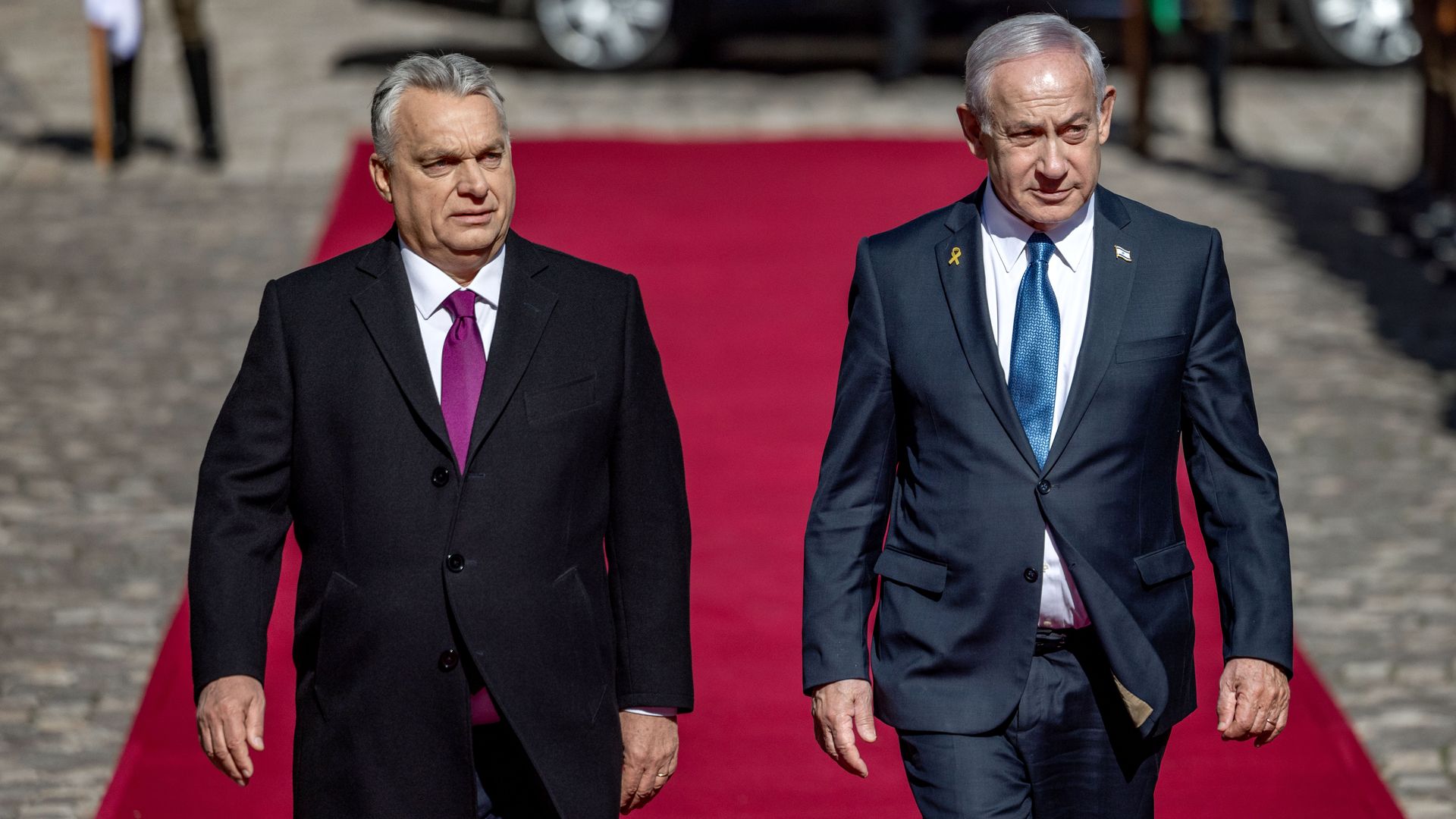 Orban and netanyahu on a red carpet