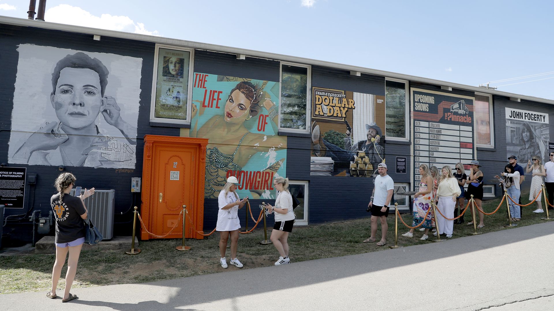 Fans attend Taylor Swift's "The Life Of A Show Girl" Orange Door Pop-Up at Grimey's on October 05, 2025 in Nashville, Tennessee. 