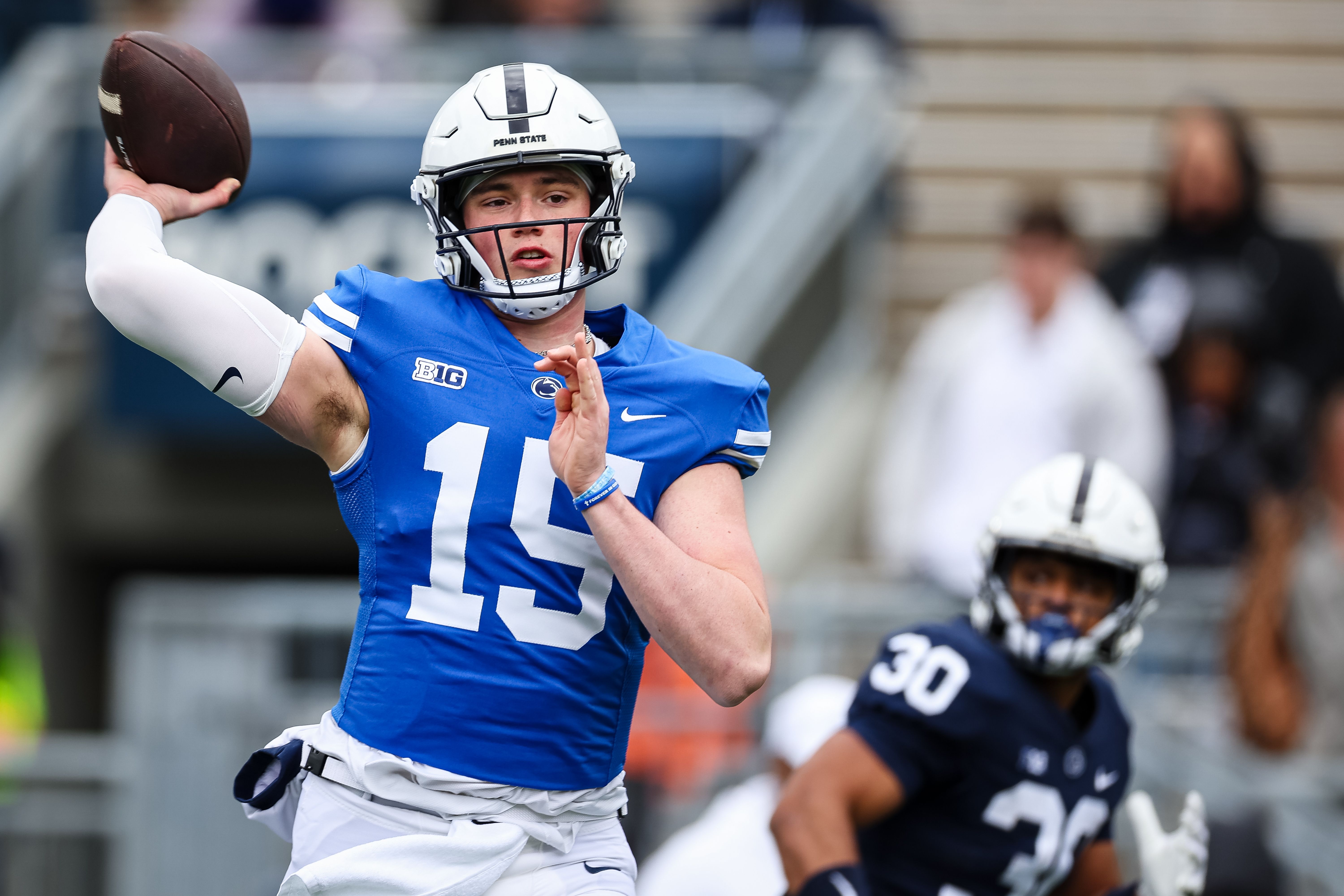penn state quarterback throwing a football