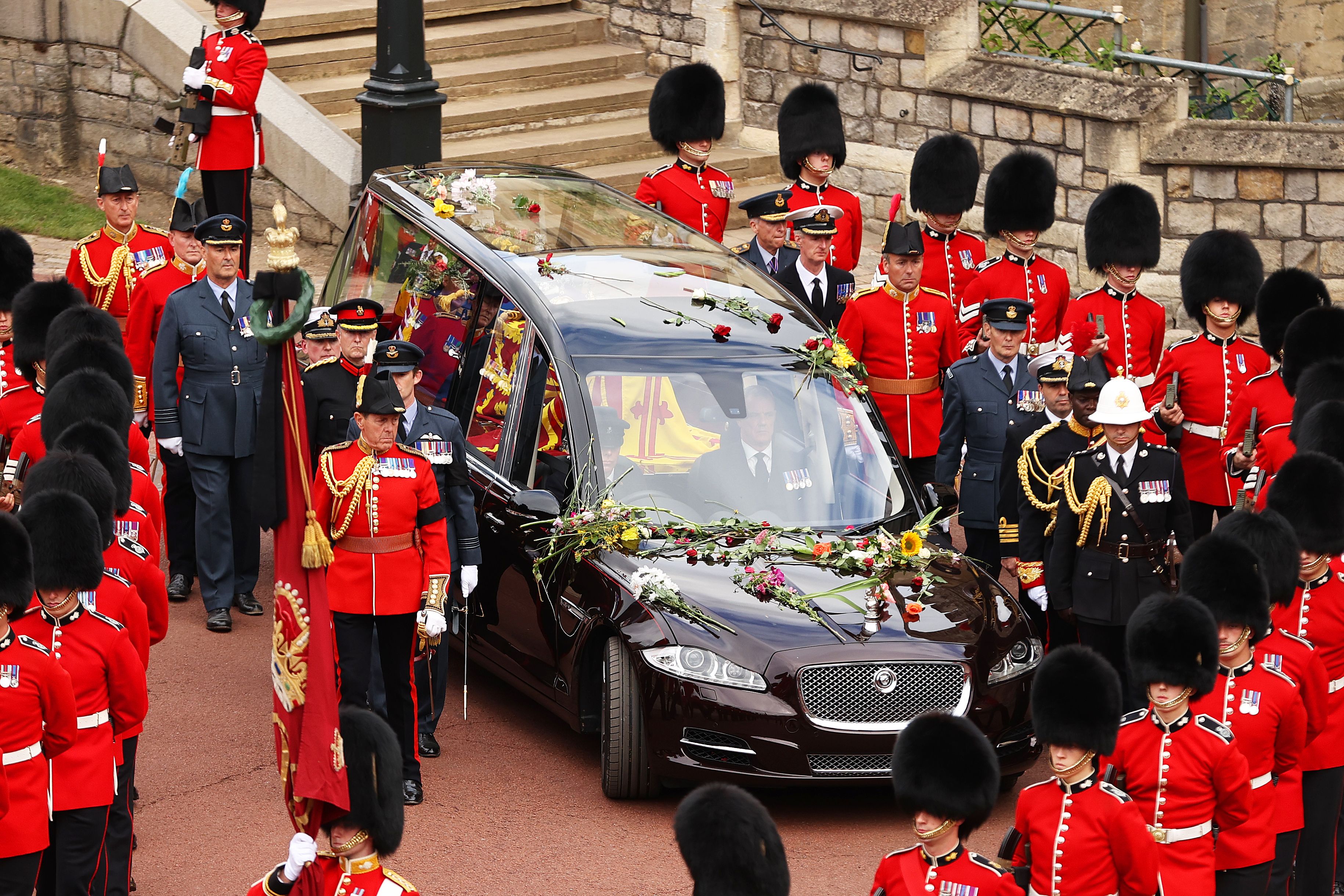 The coffin of Queen Elizabeth II is carried in The state hearse as it proceeds towards St. George's Chapel on September 19, 2022