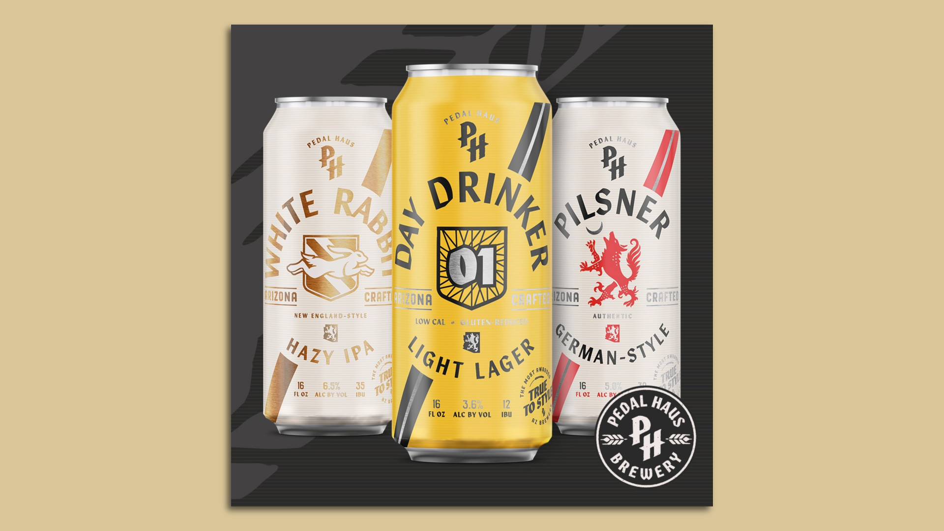 Three cans of Pedal Haus beer against a black background. 
