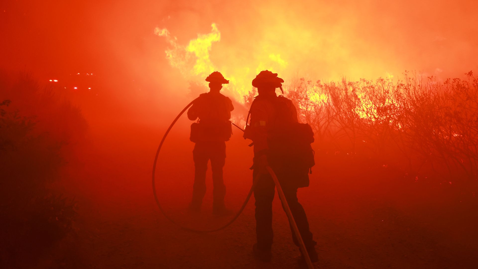 Firefighters from the Los Angeles Fire Department (LAFD) and other firemen respond to the Post Fire as it burns through the Hungry Valley State Vehicular Recreation Area in Lebec, California, on June 16, 2024.