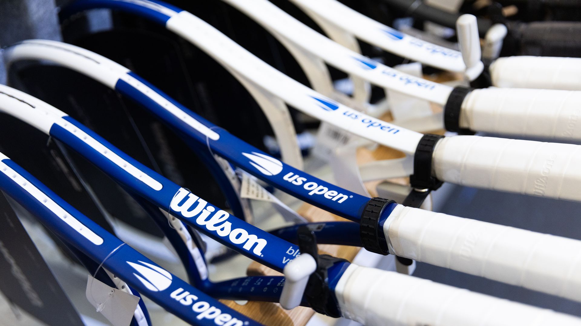 Wilson logos on tennis rackets at Paragon Sports store