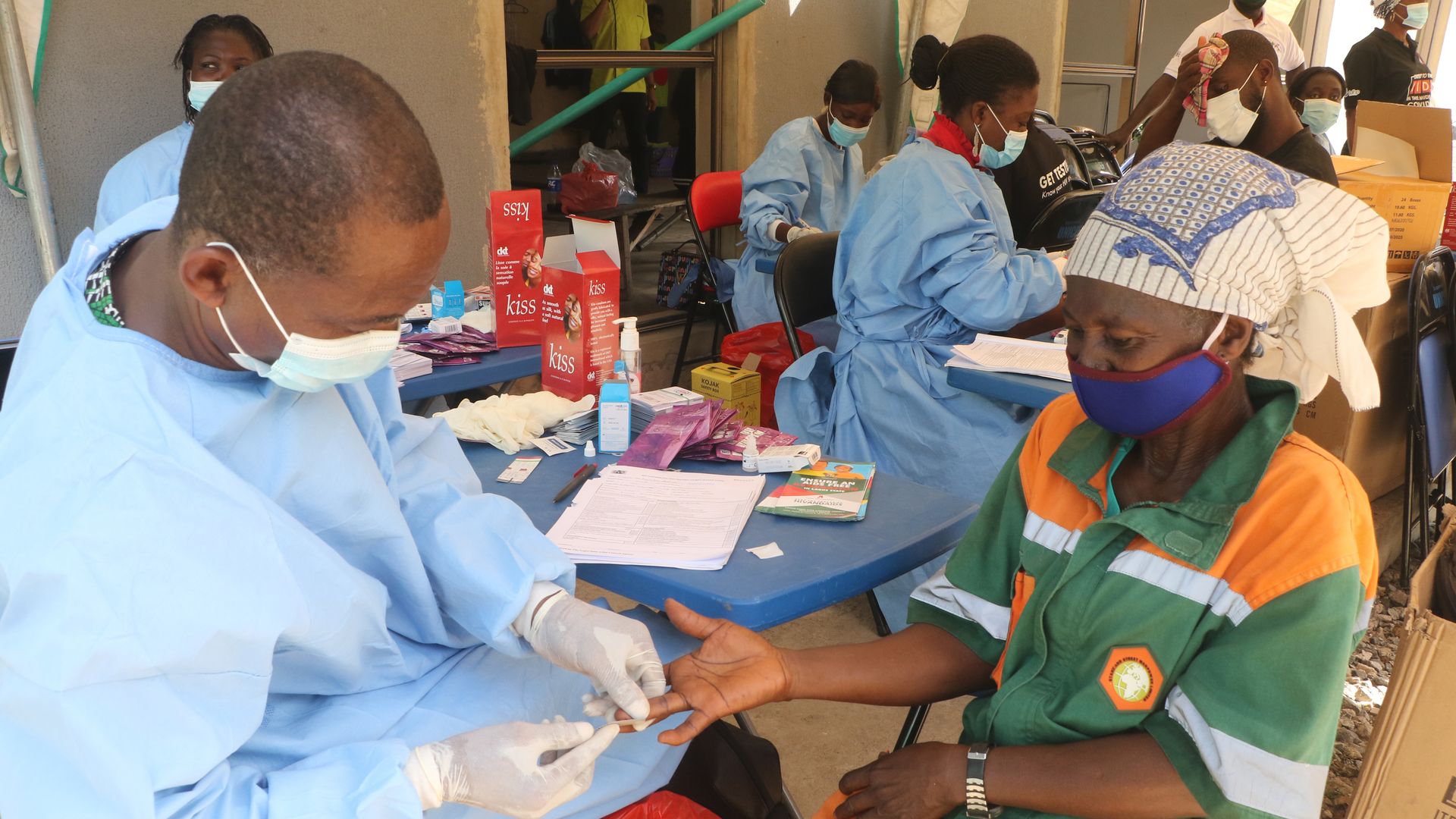 Doctor testing a patient for HIV.