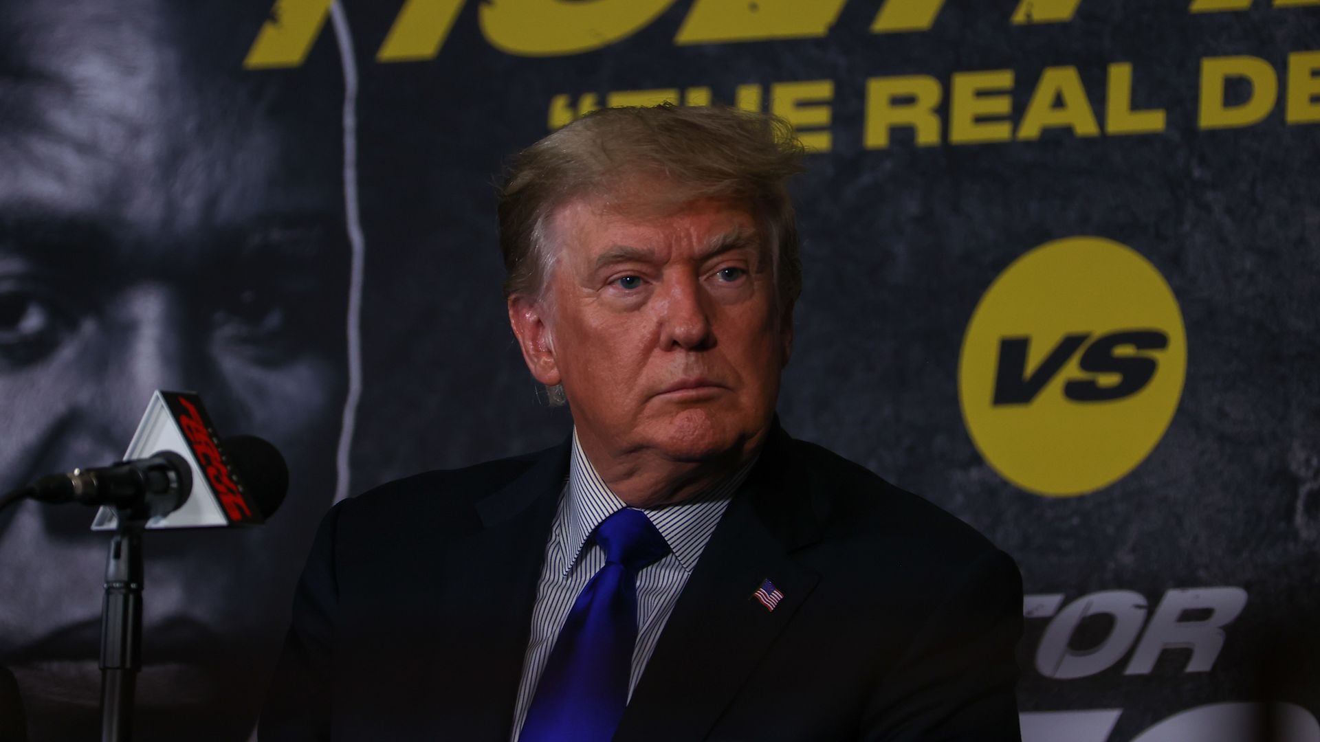 Photo of Donald Trump sitting and looking to his left