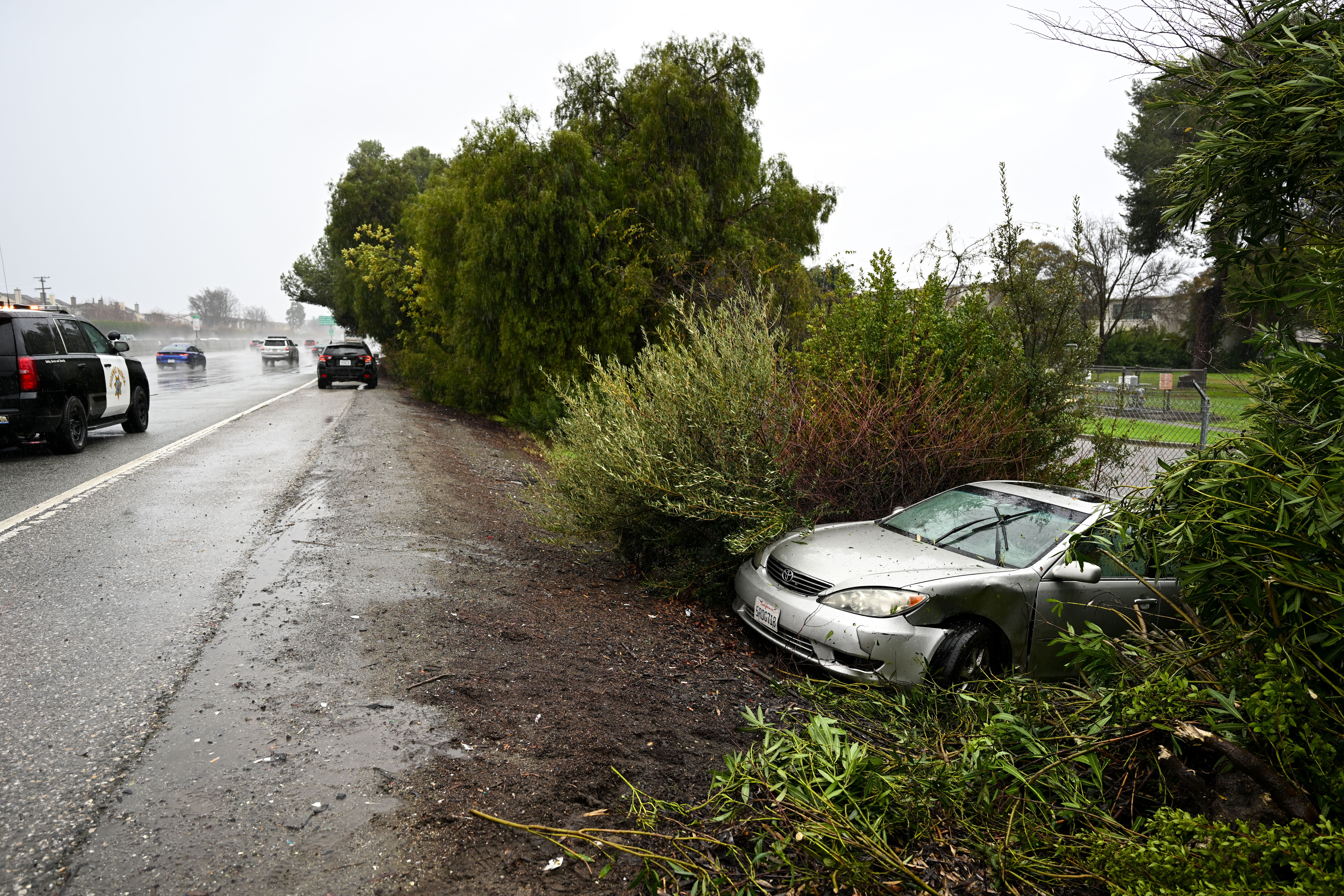 A vehicle got off the road on Highway 101 in Sunnyvale as atmospheric river storms hit California, United States on February 4, 2024.