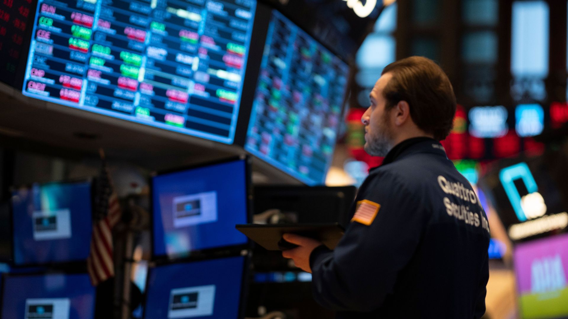 Stock traders work during open bell
