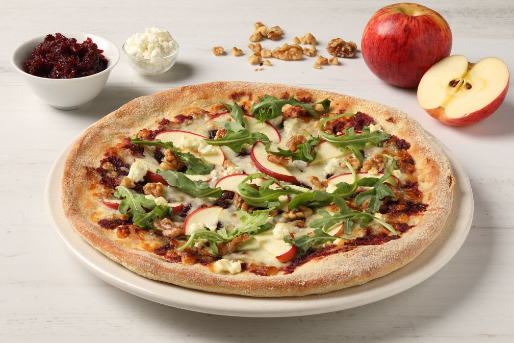 An apple and walnut pizza.