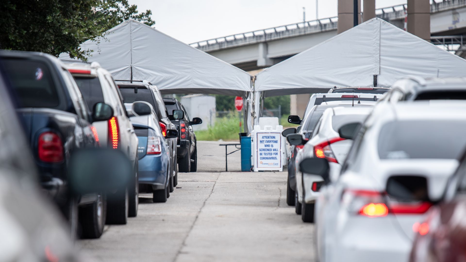 A photo of cars in line.
