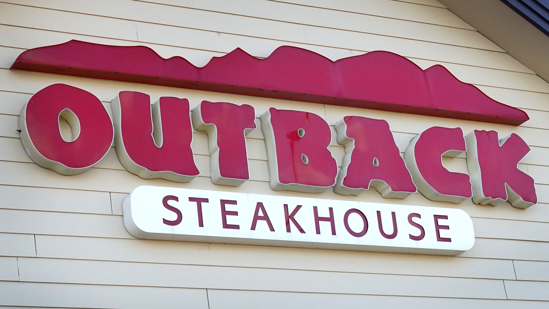 An Outback Steakhouse sign