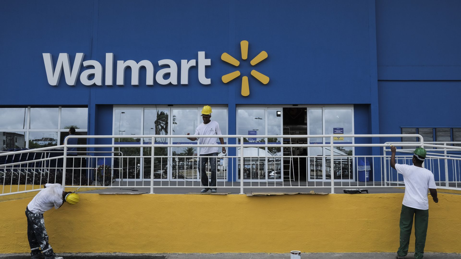 Workers preparing a Walmart store for opening in Brazil