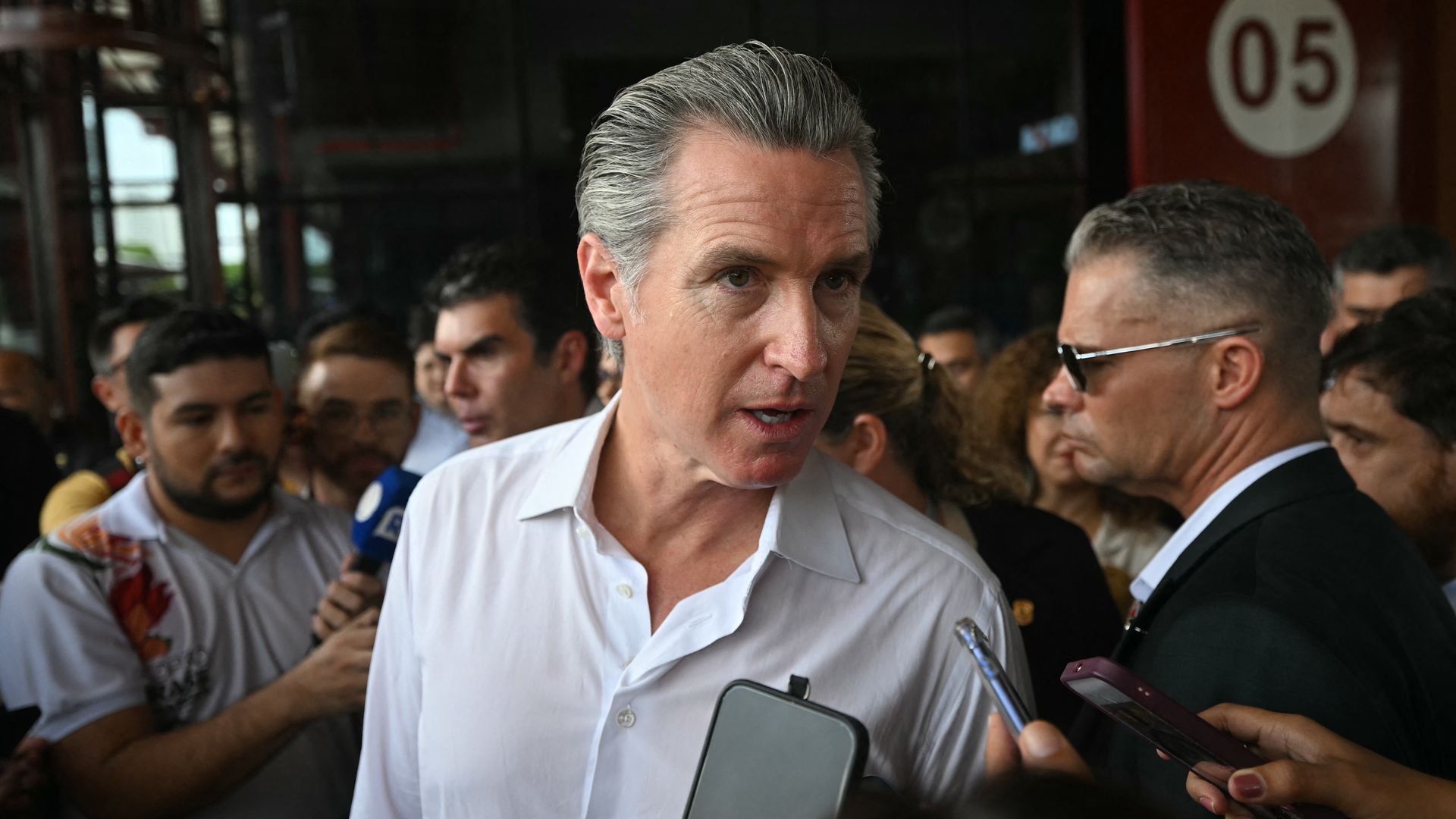 Gavin Newsom speaks to reporters