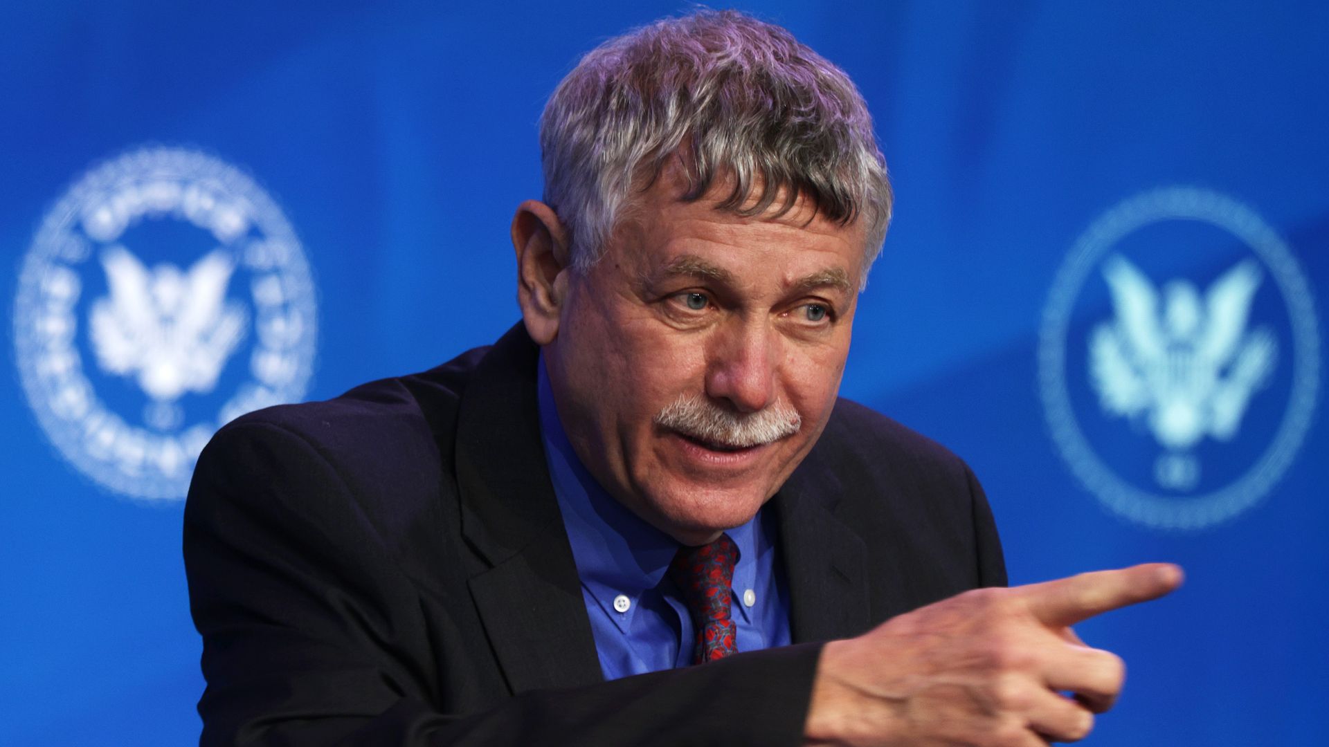 Dr. Eric Lander is seen gesturing after he was introduced by President-elect Biden.