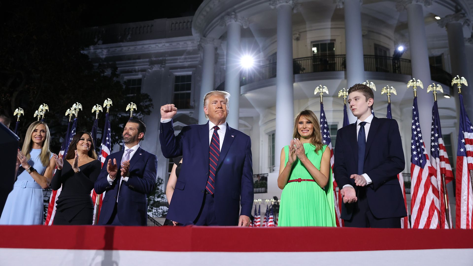 President Trump stands with his family in front of the White House after giving his Republican convention speech