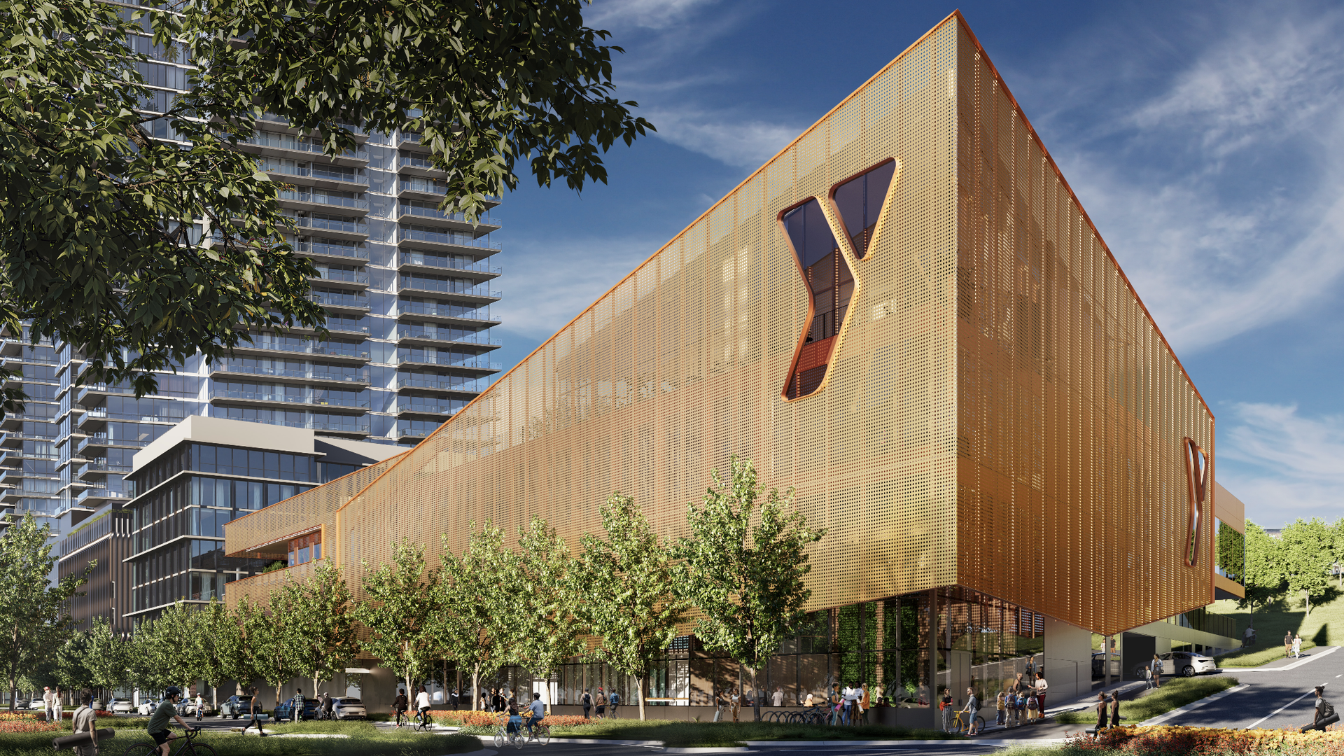 Modern orange perforated building with a large Y-shaped window, surrounded by trees, people walking and biking, and high-rise buildings under a blue sky.