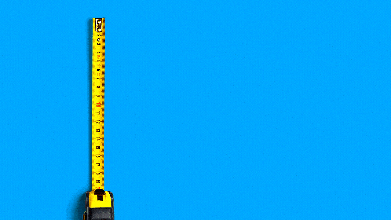 Illustration of a measuring tape next to an animated dotted line forming a letter S.  