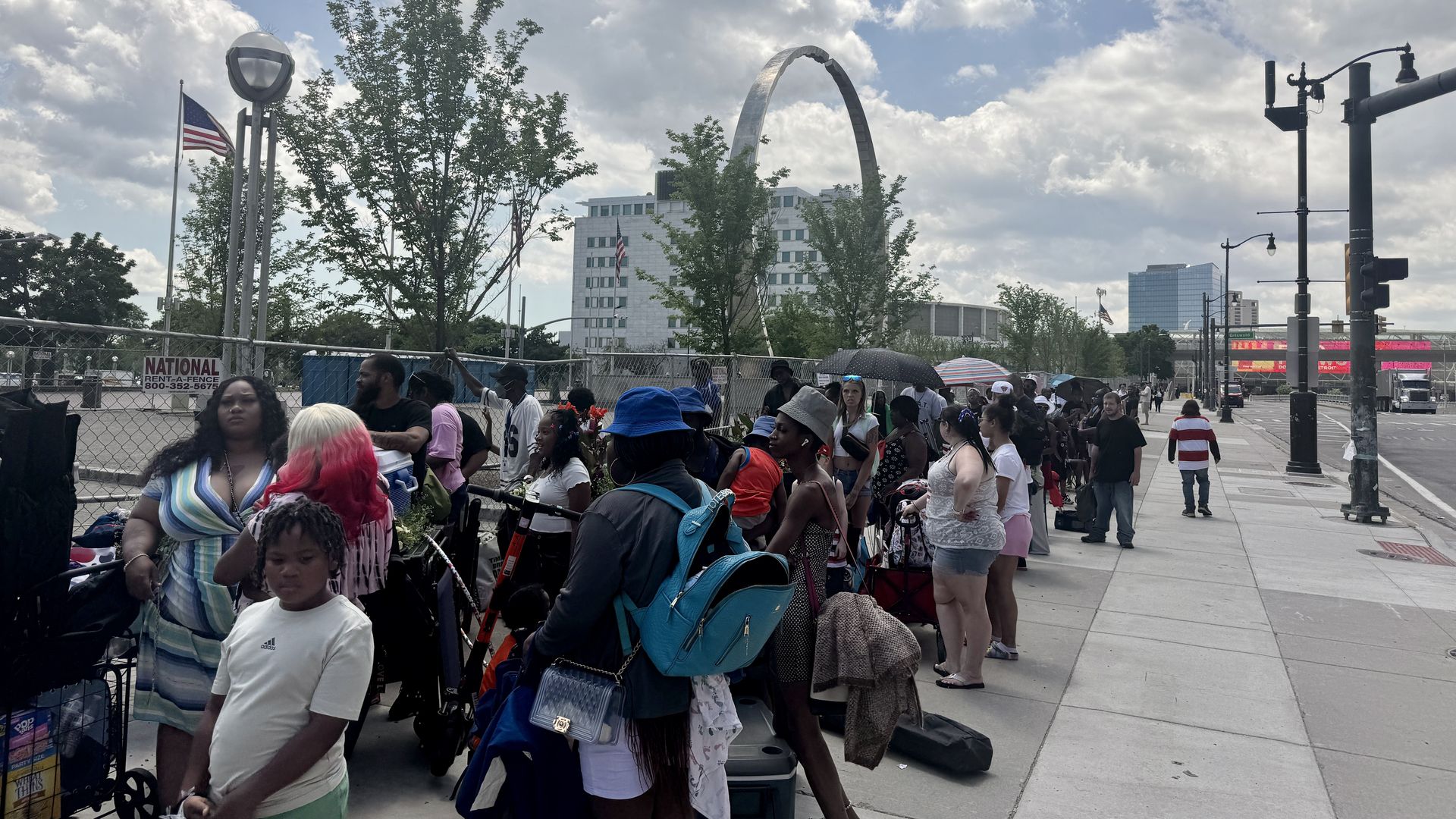 A line forms outside Hart Plaza Monday before gates open at 2pm. 