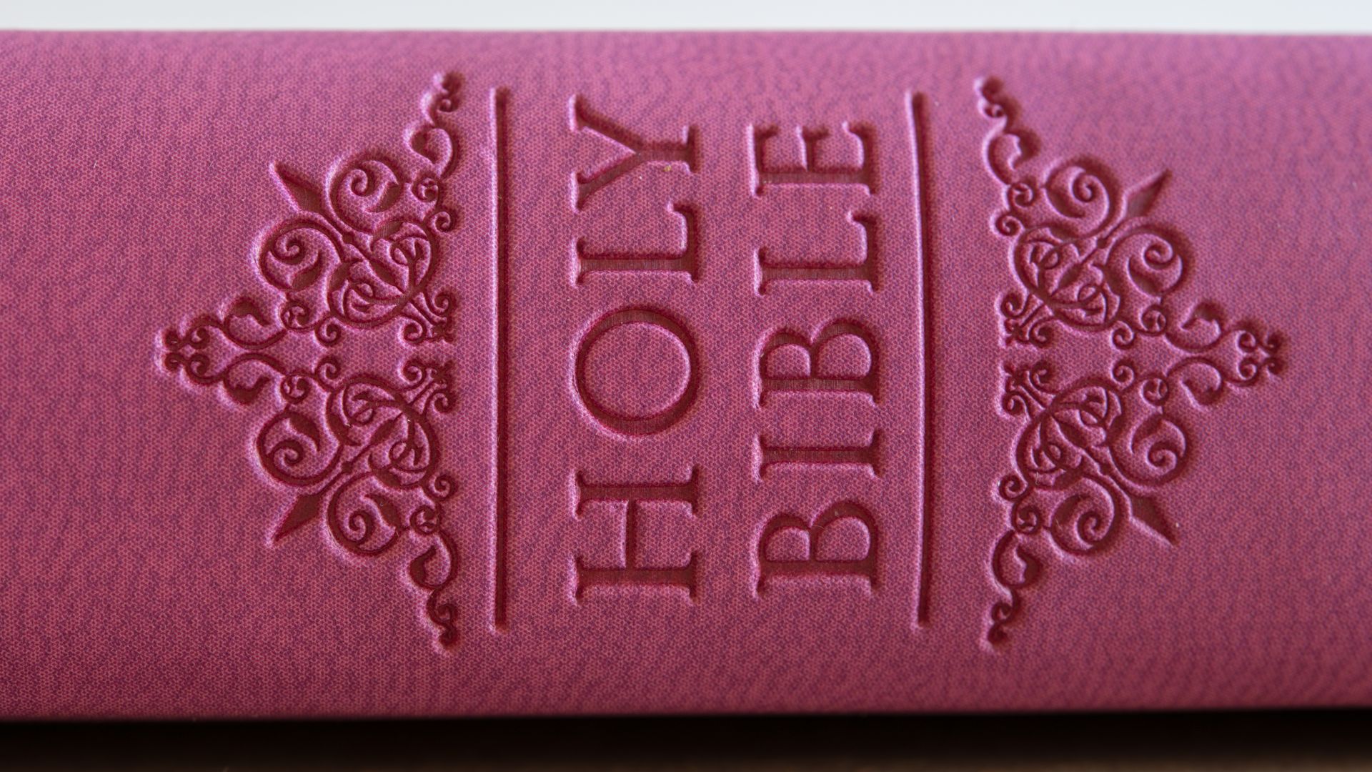 A Bible rests on its side.