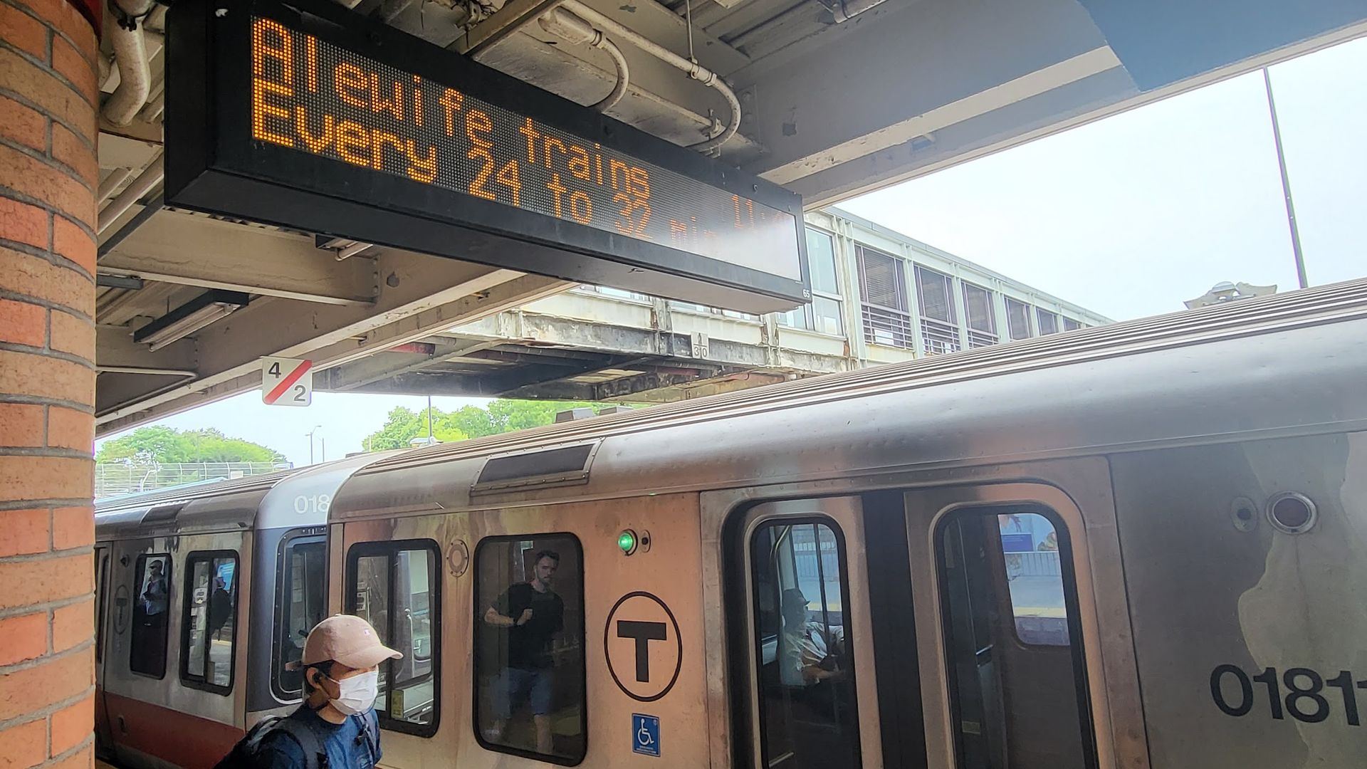 The countdown sign for an MBTA train showing a delay of 24 minutes.
