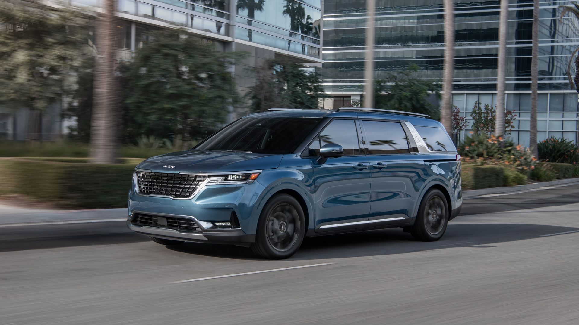Image of a blue 2022 Kia Carnival minivan