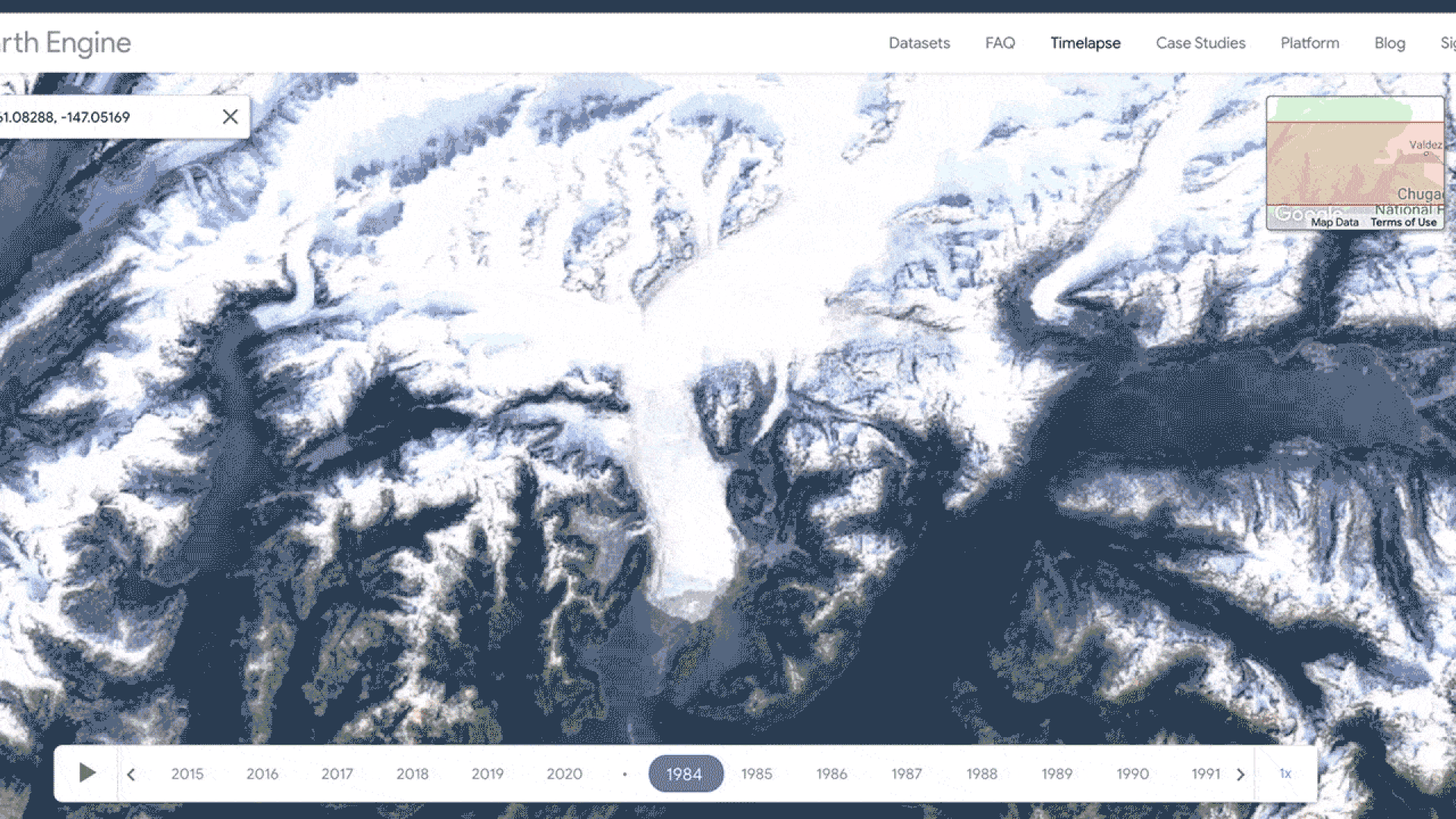 Satellite imagery showing a glacier getting smaller over time.
