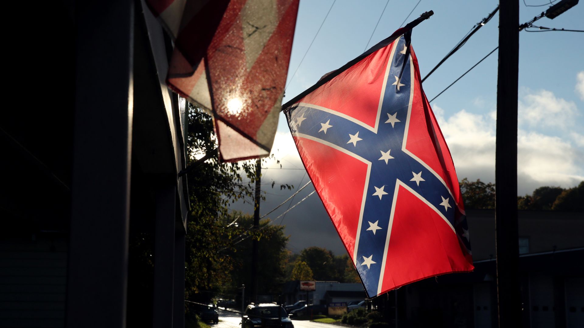 Confederate flag hanging off a porch