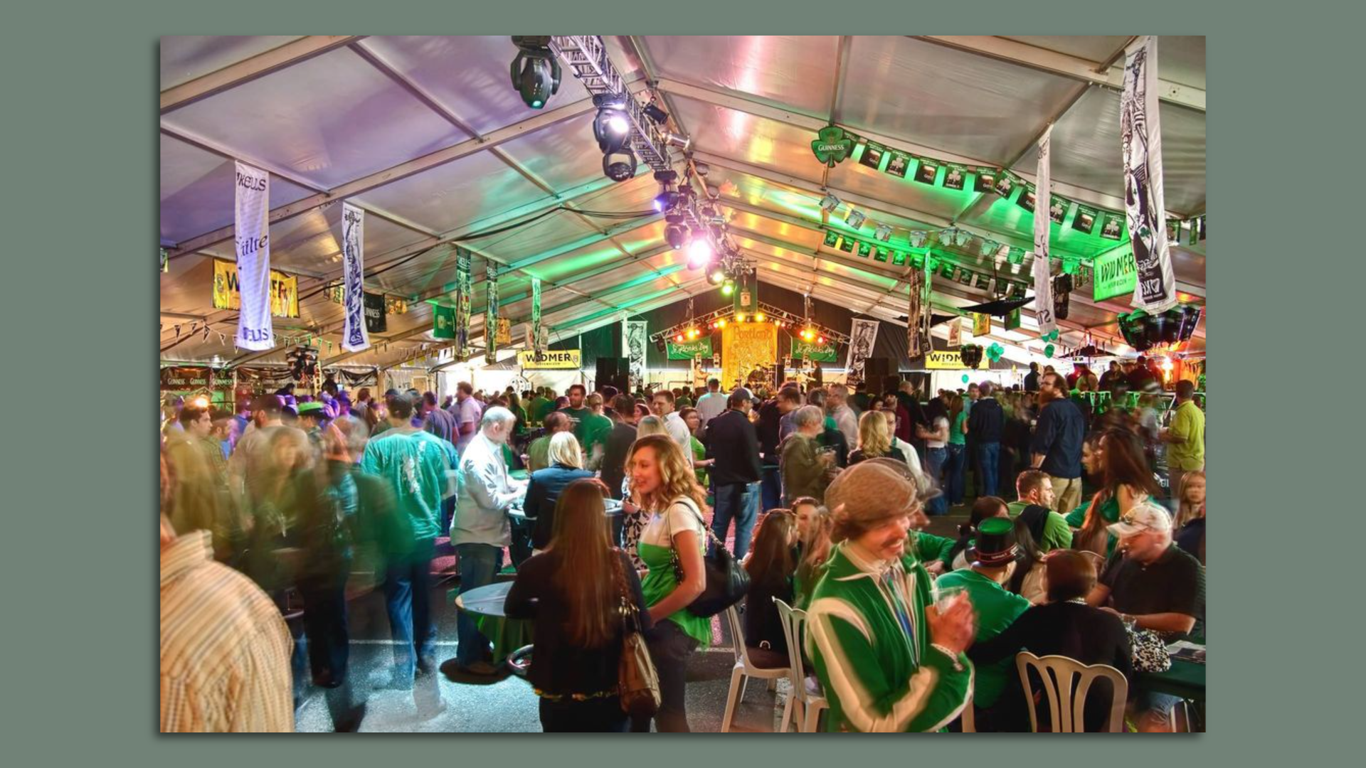 Revelers in a tent in Portland at the Kells Portland Irish Festival