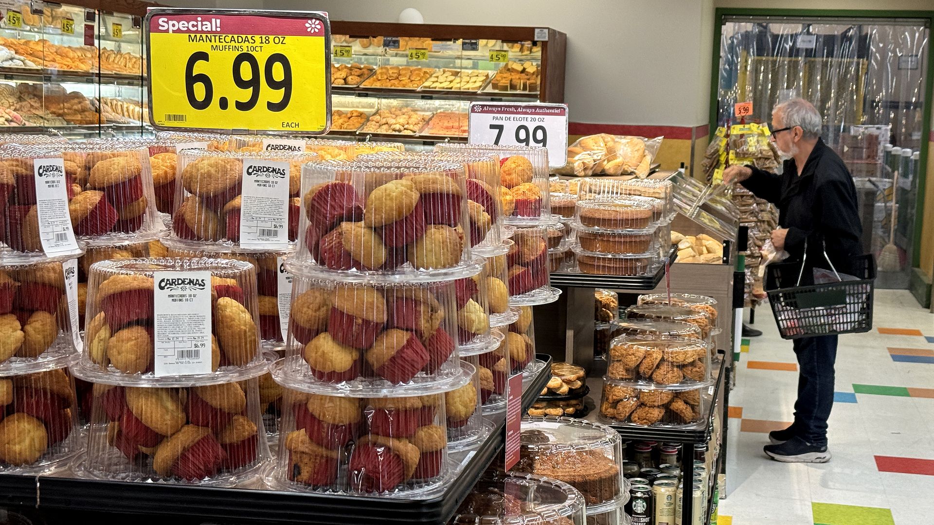 A customer shops for food at a grocery store on March 12, 2024 in San Rafael, California.