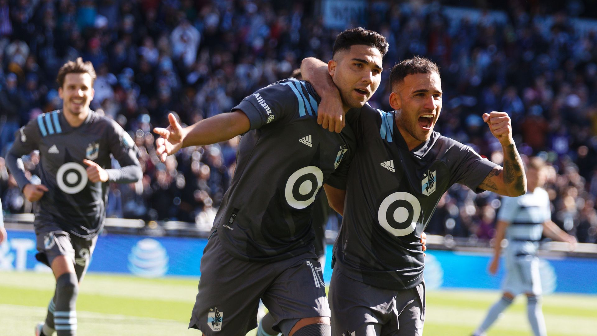 Franco Fragapane celebrates with Emanuel Reynoso