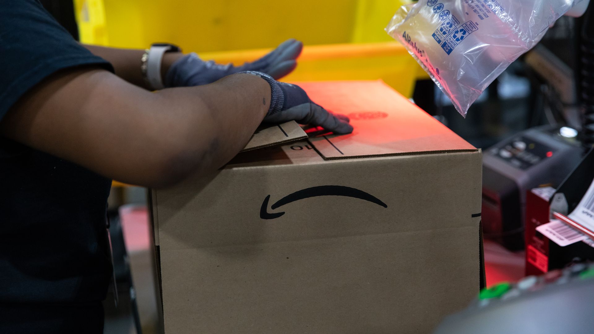 Amazon box being taped up