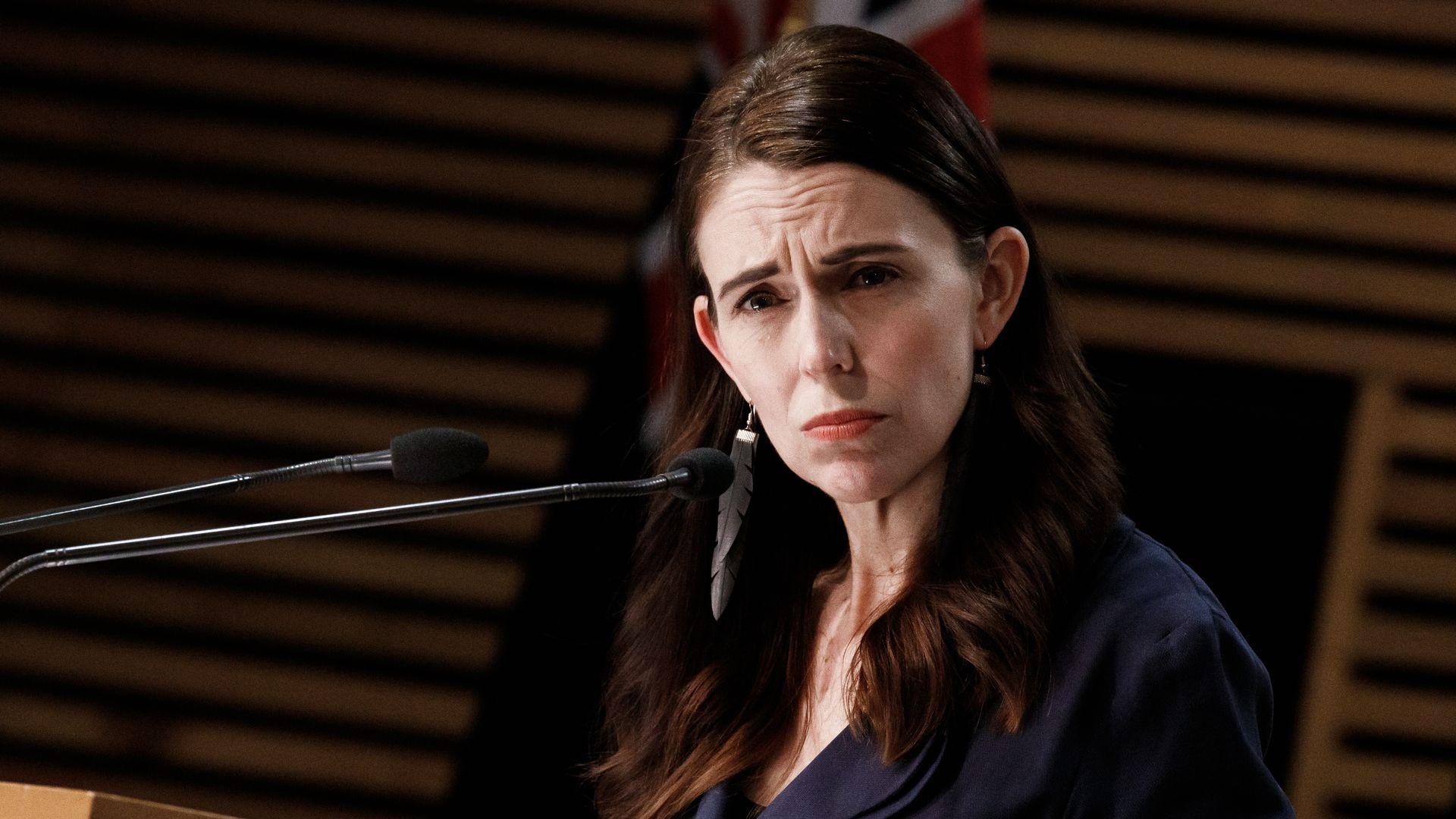 Prime Minister Jacinda Ardern reacts during a COVID-19 response update at Parliament on Saturday in Wellington, New Zealand.