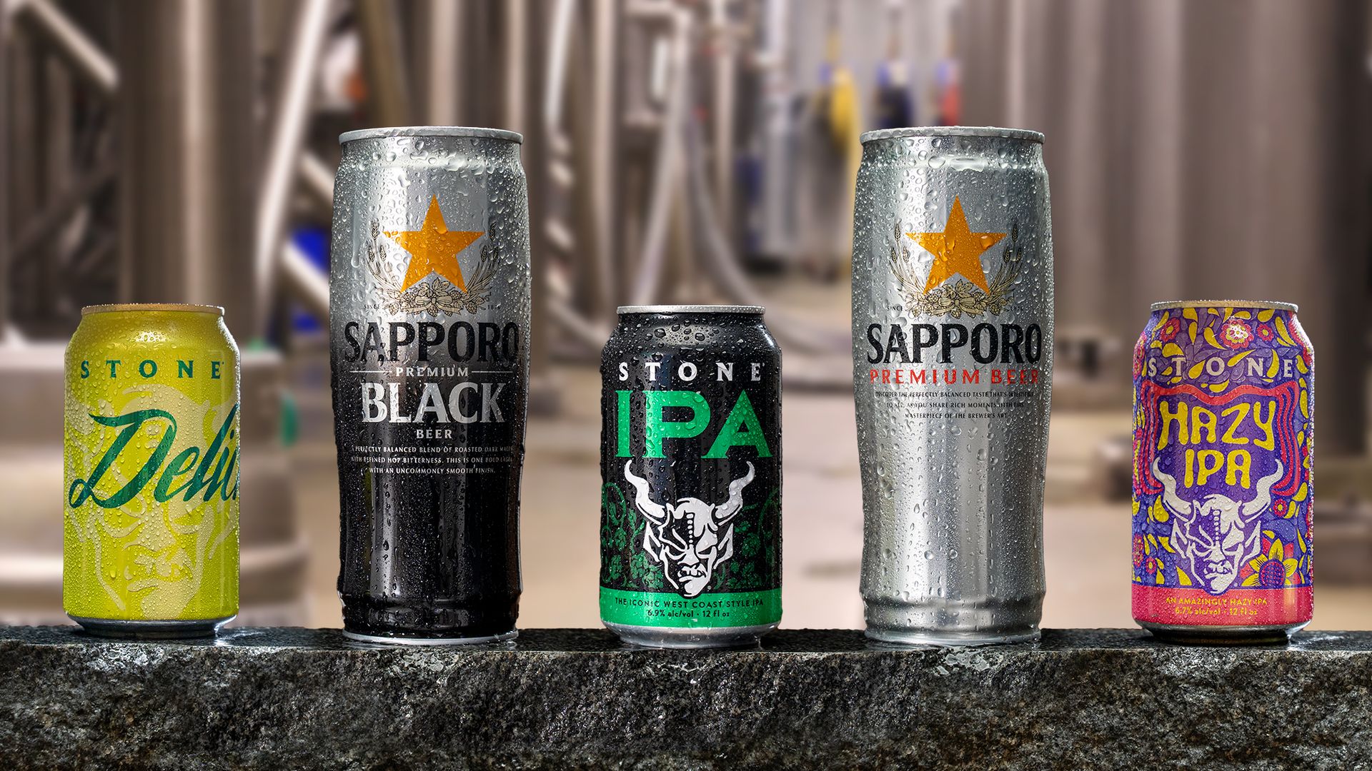 Sapporo and Stone beer cans lined up