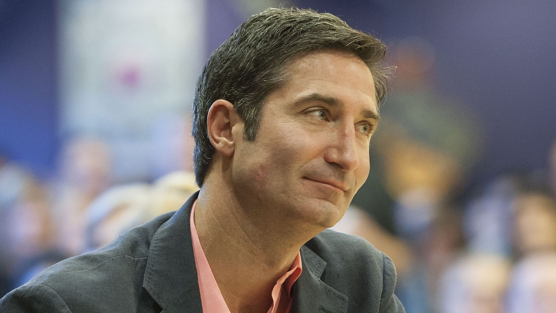Brian Niccol smiling slightly, looking to his right.
