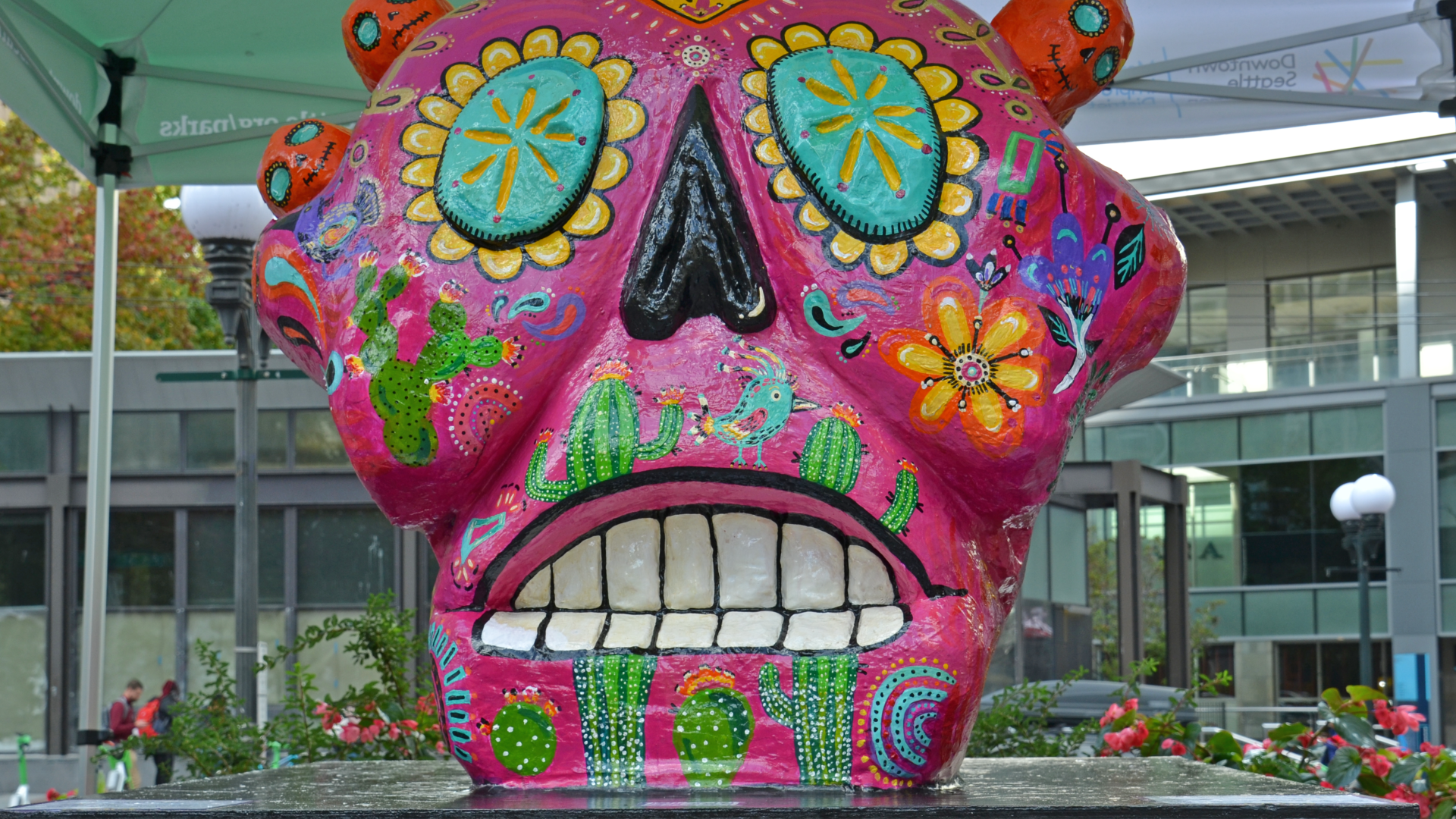 Displays of giant, colorful skull sculptures in Seattle parks are among the Día de los Muertos celebrations this year. 