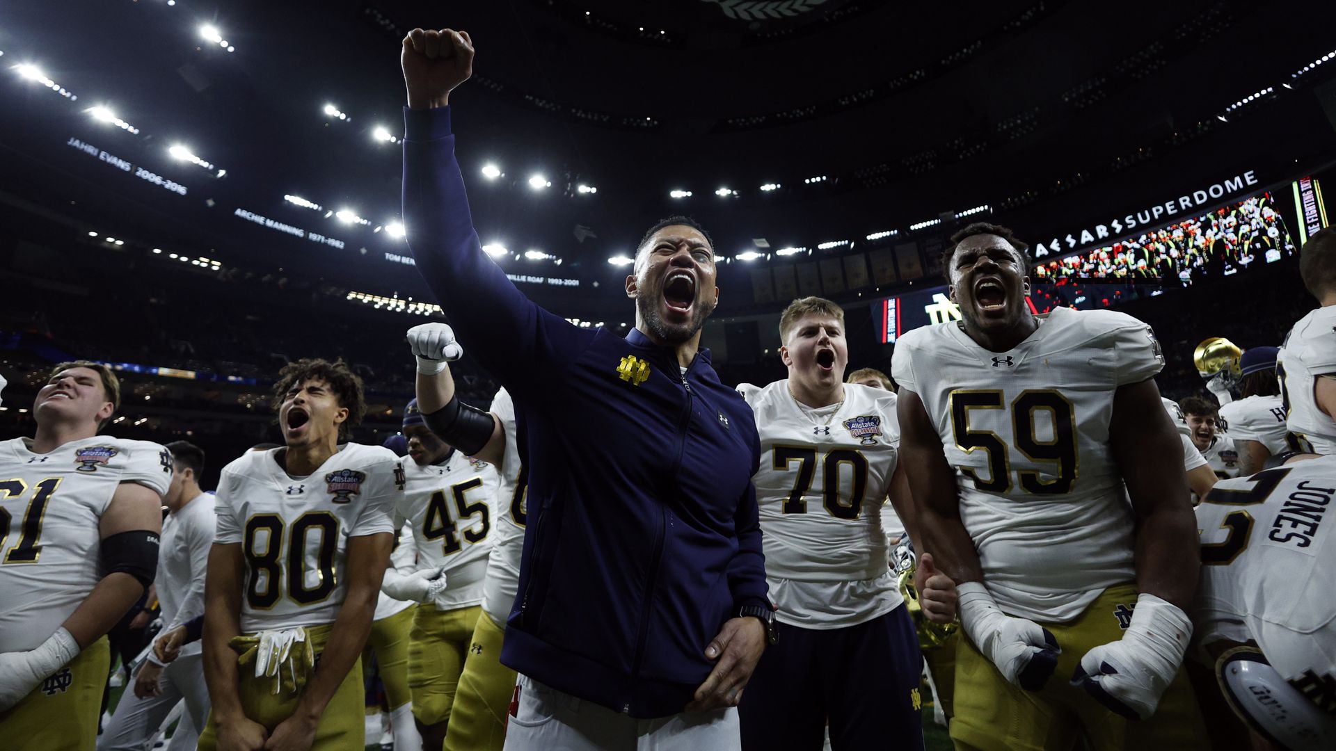  Head coach Marcus Freeman of the Notre Dame Fighting Irish celebrates with his team after a 23-10 victory against the Georgia Bulldogs in the 91st Allstate Sugar Bowl at Caesars Superdome on January 02, 2025 in New Orleans, Louisiana. 
