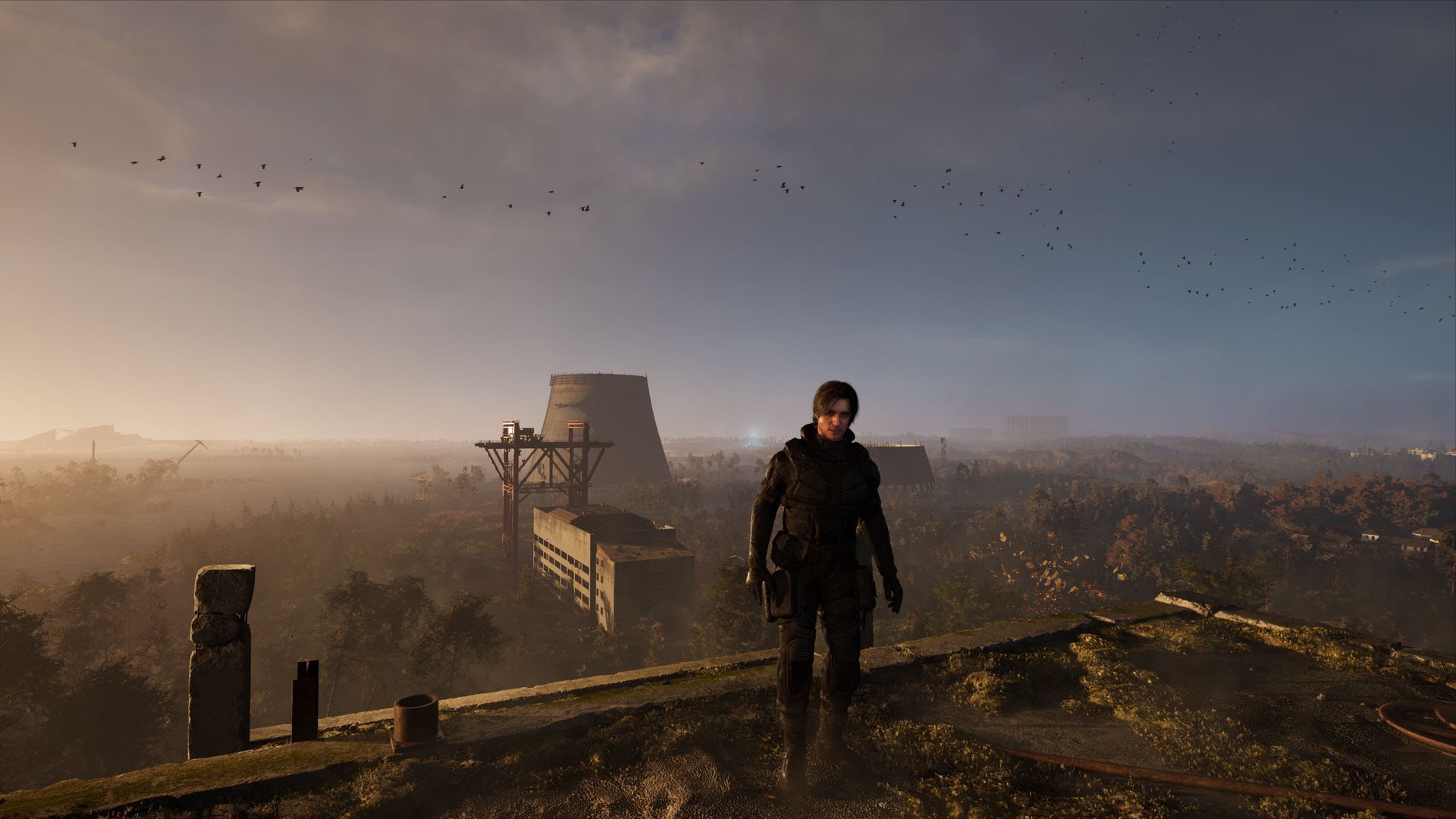 A screenshot from S.T.A.L.K.E.R. 2 showing a character standing in a wasteland with cooling towers in the background.