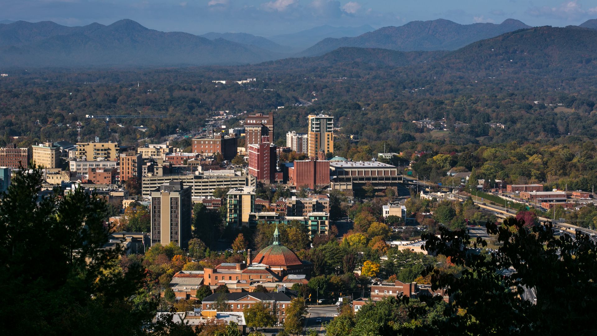 The downtown skyline is viewed on a sunny autumn day on October 20, 2016 near Asheville, North Carolina. 