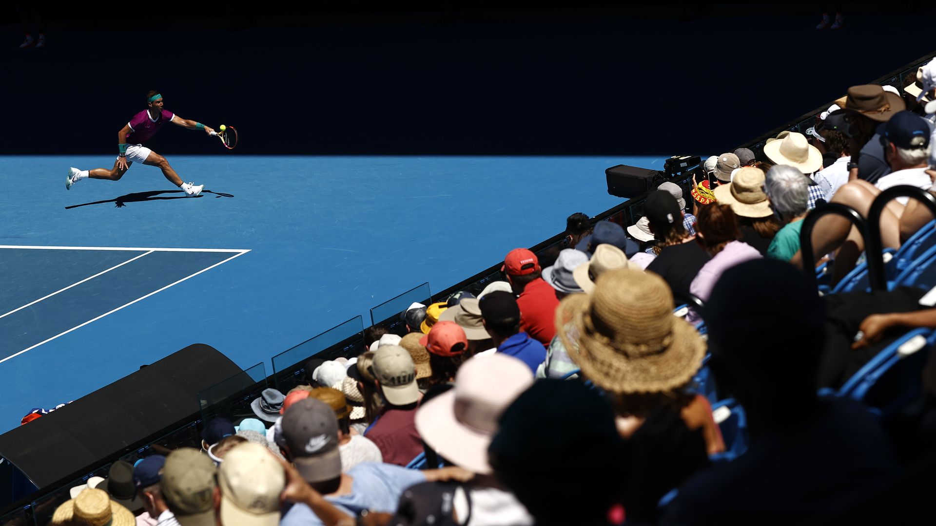 Rafael Nadal plays a point