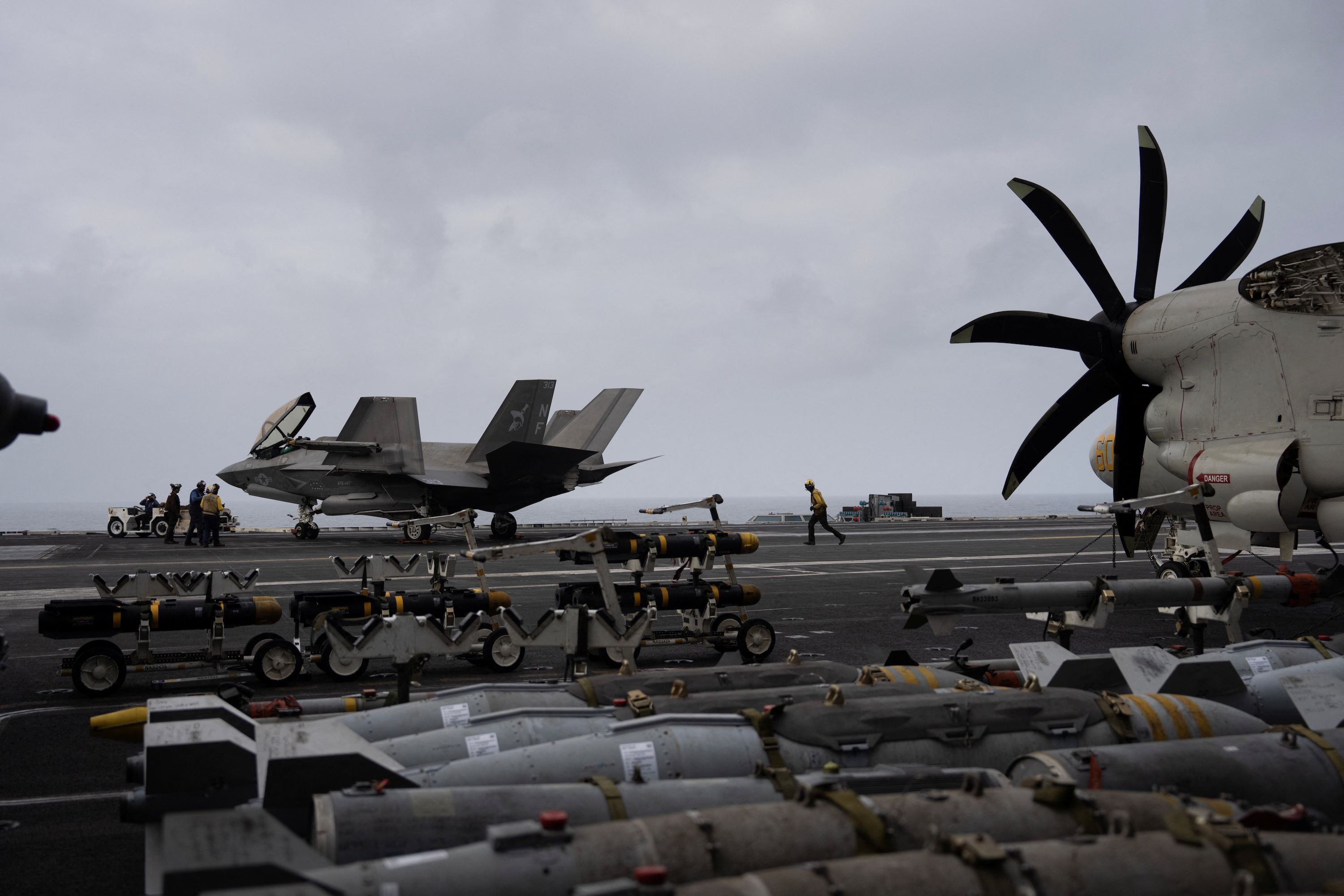 A sailor runs down the flight deck of the USS George Washington in the Arabian Sea last month.