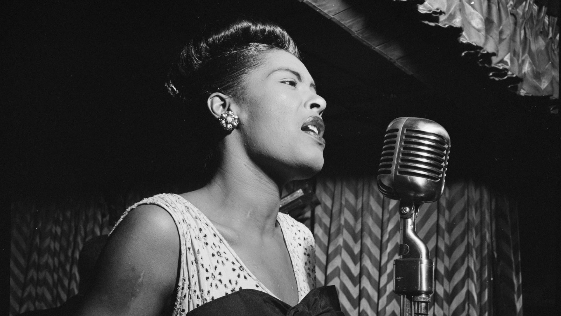 American jazz singer Billie Holiday is shown performing at the Club Downbeat in Manhattan in February 1947.