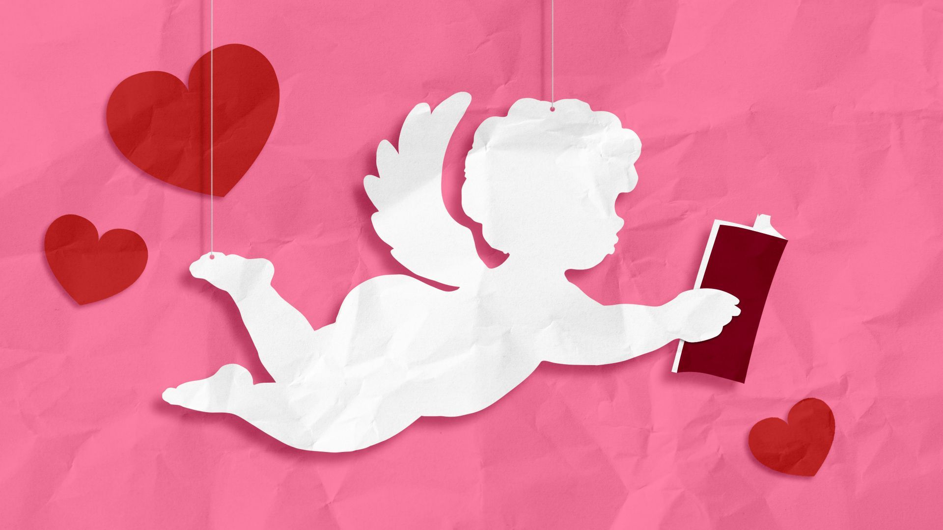 Illustration of a paper silhouette of cupid reading a book, surrounded by hearts. 
