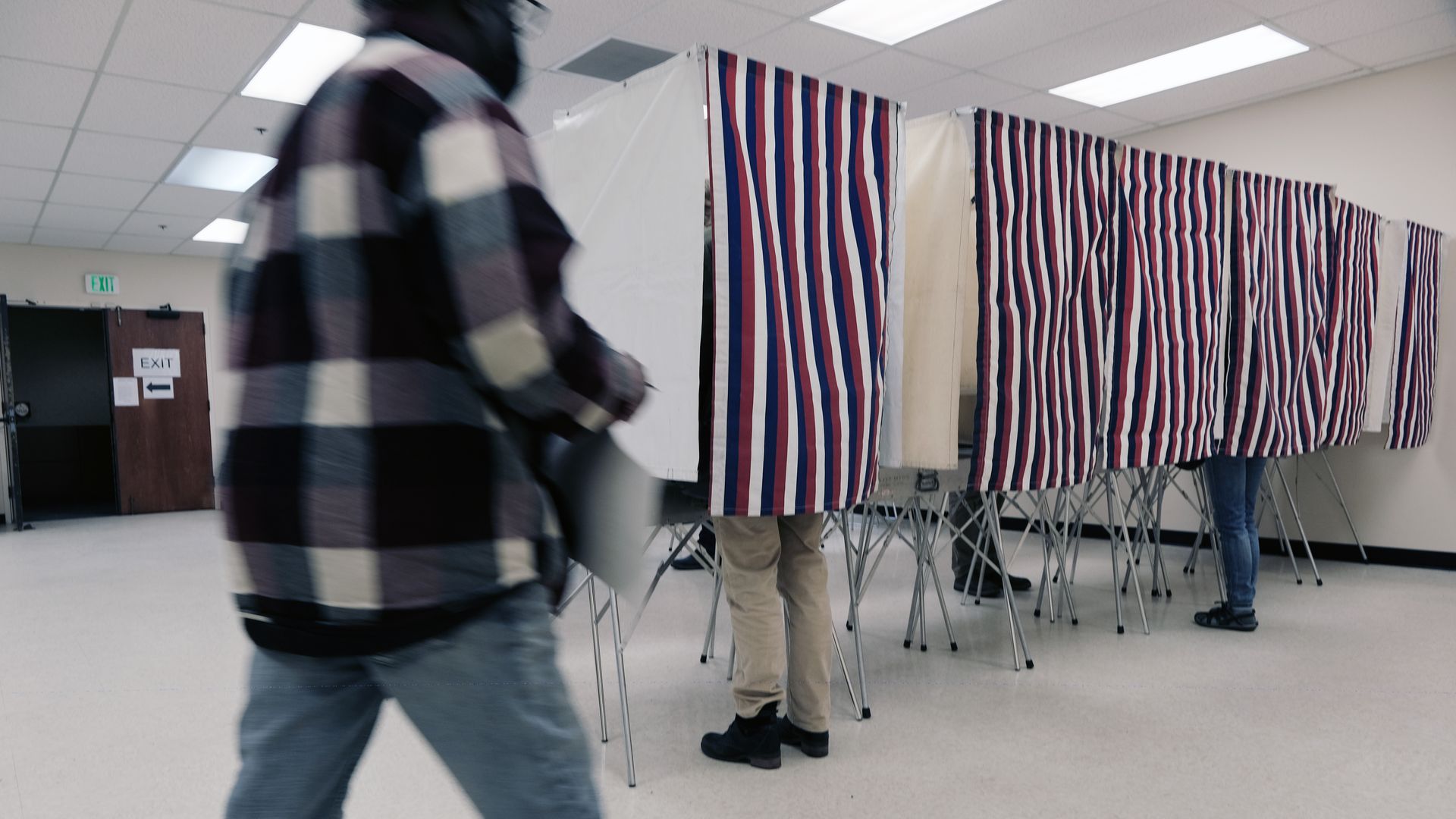 People cast early ballots in the upcoming midterm elections at a polling station on November 01, 2022 in Anchorage, Alaska.