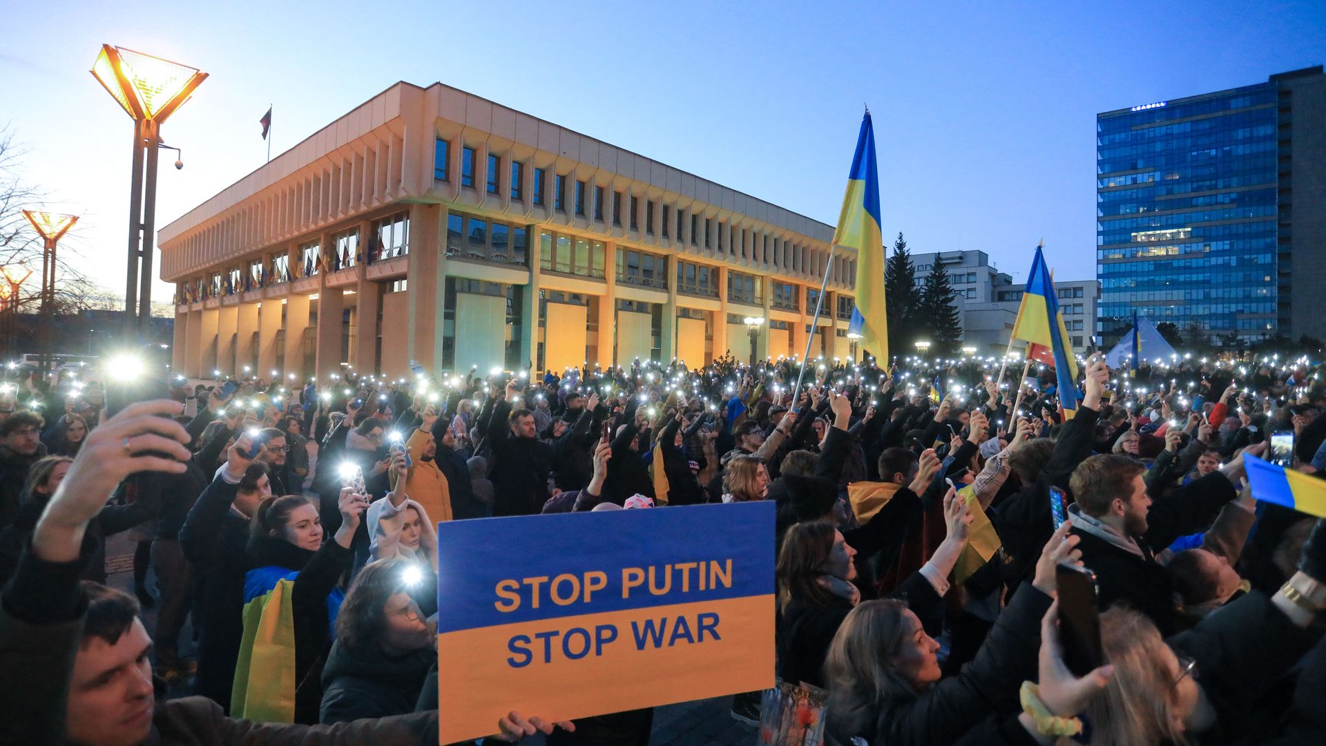 Demonstrators take part in a protest against the Russian invasion of Ukraine at Independence Square in front of the Parliament Palace i
