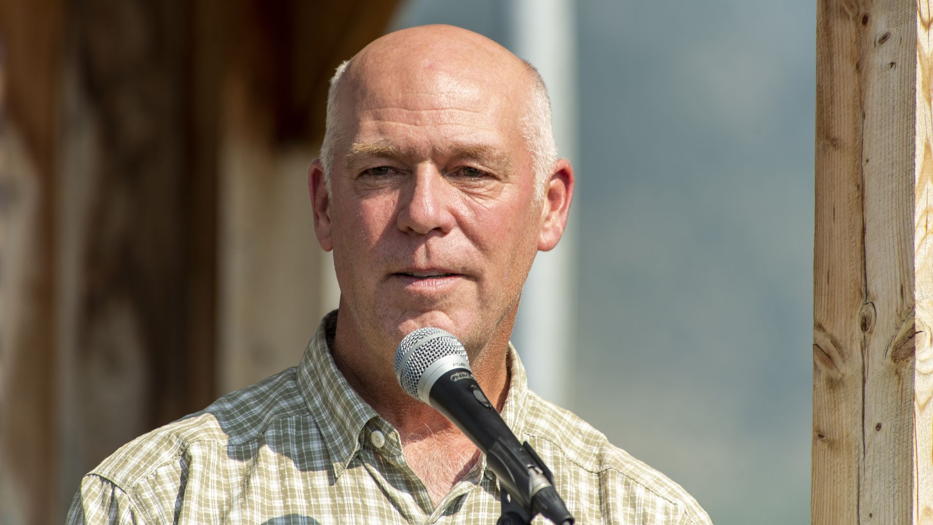 Montana Gov. Greg Gianforte speaking in the town of Emigrant in July 2021.