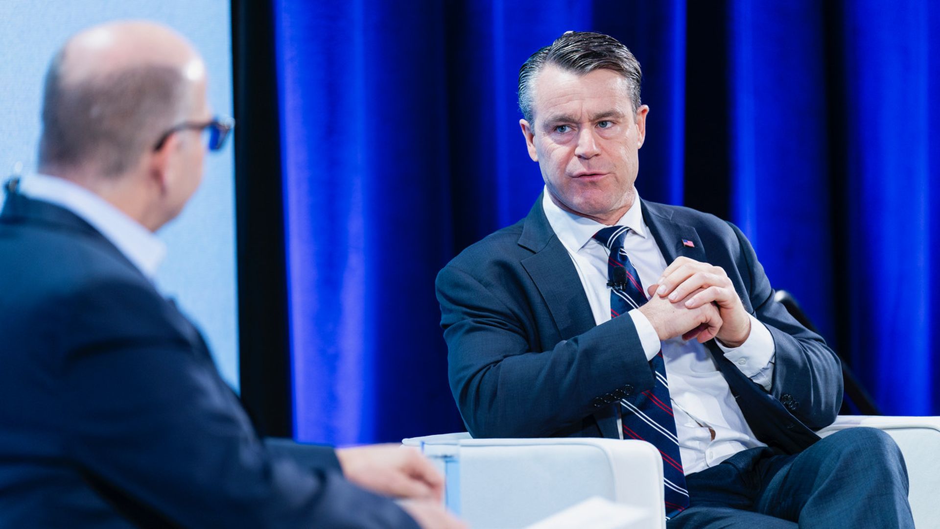 Senator Todd Young being interviewed by Axios co-founder Mike Allen at the Axios AI+ DC Summit