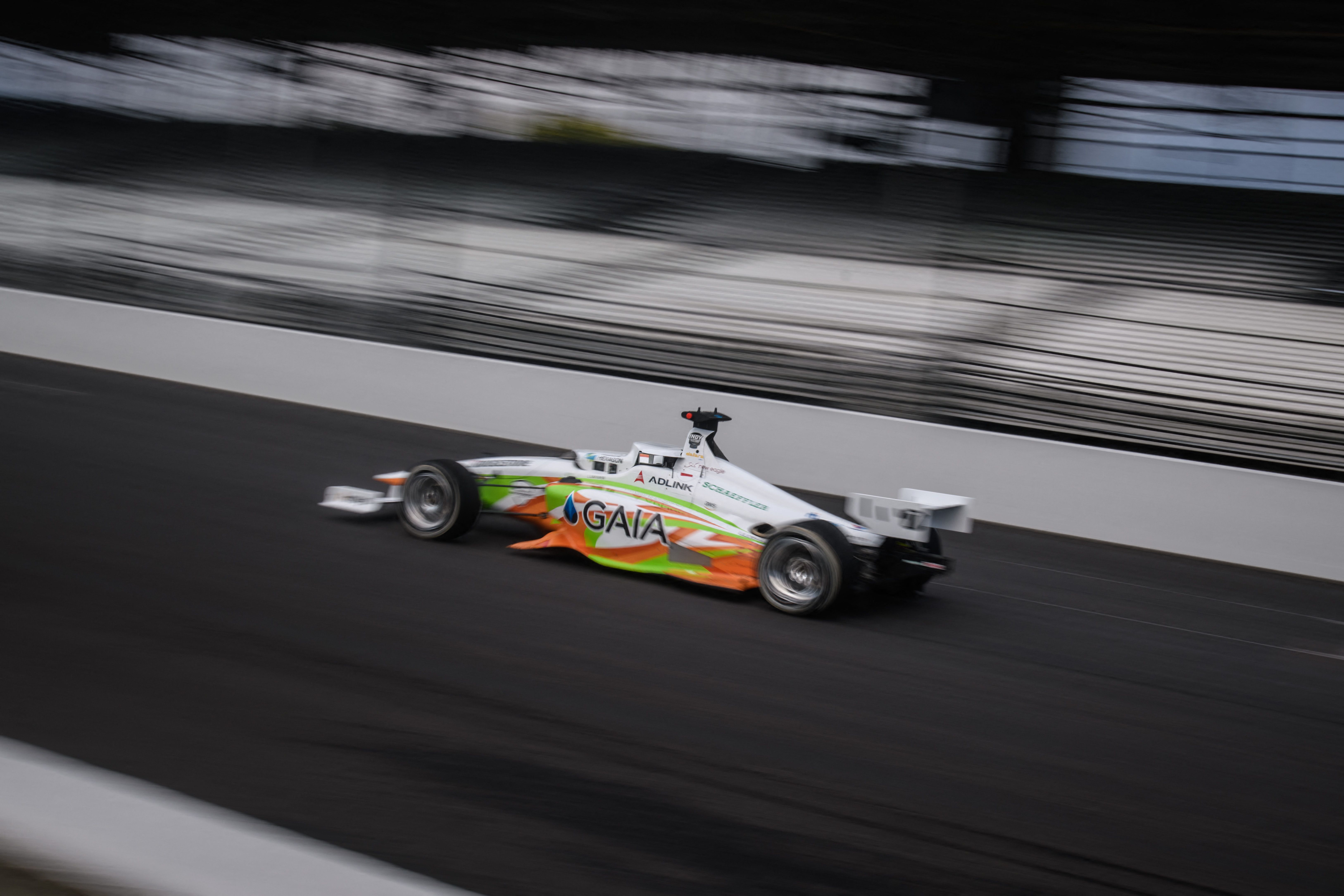 The car of AI Racing Tech of Hawaii University completes a lap during the Indy Autonomous Challenge race at the Indianapolis Speedway in Indianapolis on October 23. 