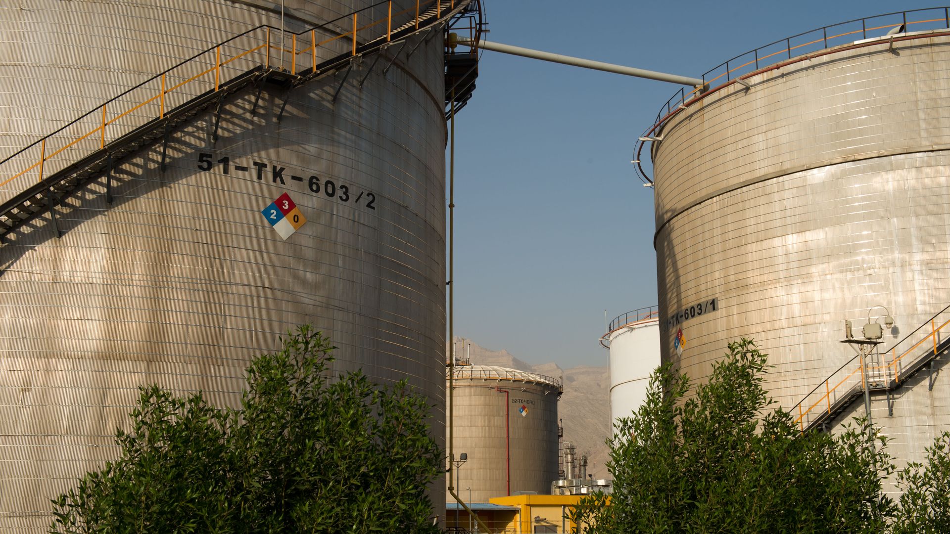 Chemical storage tanks stand at petrochemical complex in Iran