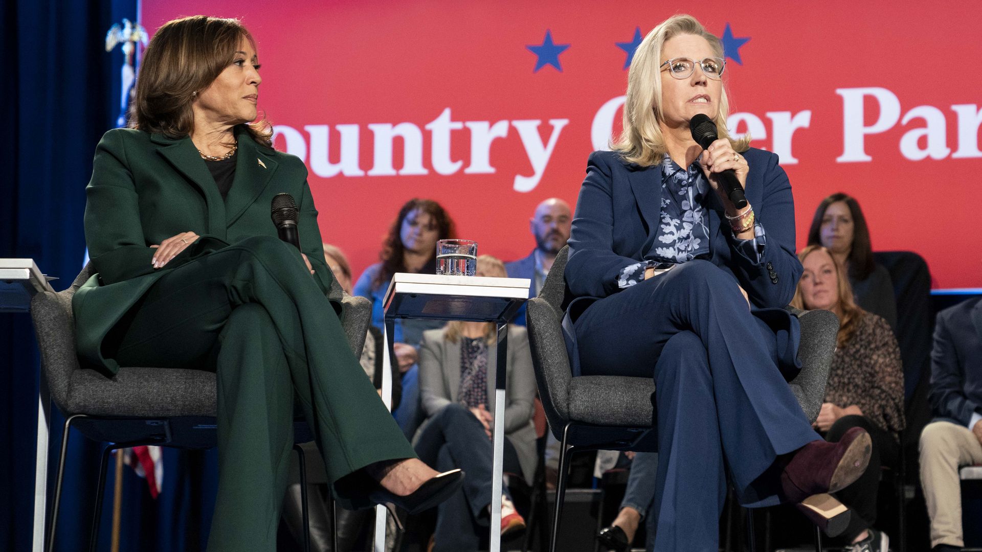 Democratic presidential nominee, Vice President Kamala Harris sits with former U.S. Rep. Liz Cheney (R-WY) for a town hall at the Royal Oak Music Theatre on October 21, 2024 in Royal Oak, Michigan.